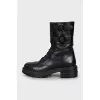 Leather boots with laces and buckles