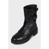 Leather boots with laces and buckles
