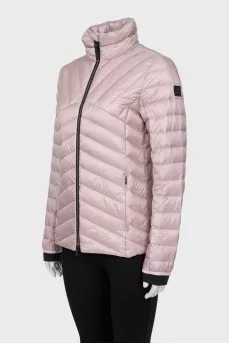 Pink quilted jacket with a zipper