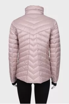 Pink quilted jacket with a zipper