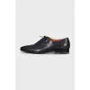 Men's leather shoes with perforated toes