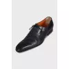 Men's leather shoes with perforated toes
