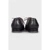Men's leather shoes with perforated toes