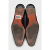 Men's leather shoes with perforated toes