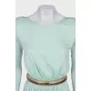 Fitted dress with a gold belt