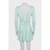Fitted dress with a gold belt