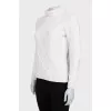 Knitted white sweater with a pattern