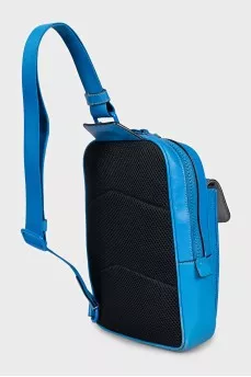 Canvas and leather backpack with a patch pocket