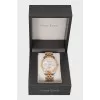 Men's silver watch with gold accents