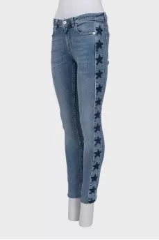 Blue skinny fit jeans with a star print