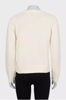 Knitted jumper with embroidery