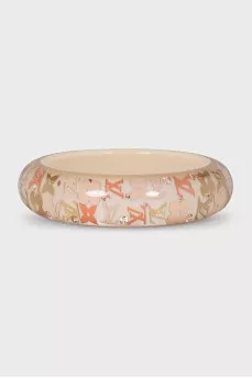 Rigid bracelet decorated with rhinestones and logo
