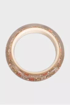 Rigid bracelet decorated with rhinestones and logo