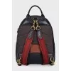 Backpack with accent handles