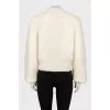 Beige sweater with a patch