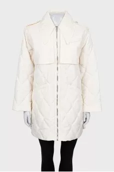 White quilted jacket with a zip