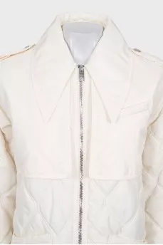 White quilted jacket with a zip