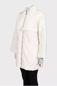 White quilted jacket with a zip