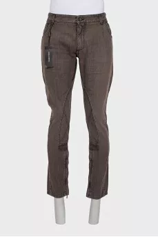 Men's jeans with zippers at the bottom with tag
