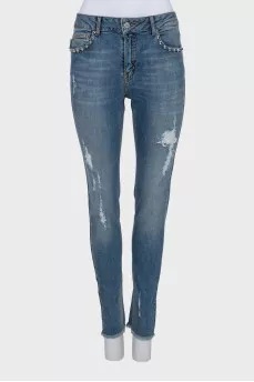 Рваные джинсы skinny fit с шипами