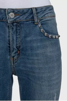 Рваные джинсы skinny fit с шипами