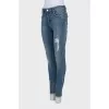 Рваные джинсы skinny fit с шипами