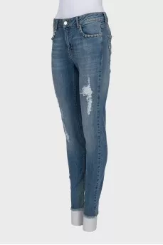 Рваные джинсы skinny fit с шипами