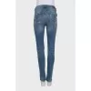 Рваные джинсы skinny fit с шипами
