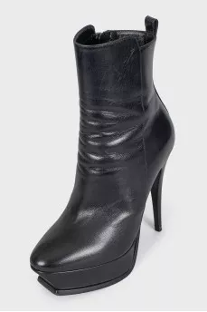 Black leather ankle boots with heels and platform