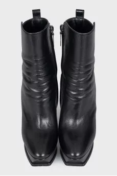 Black leather ankle boots with heels and platform