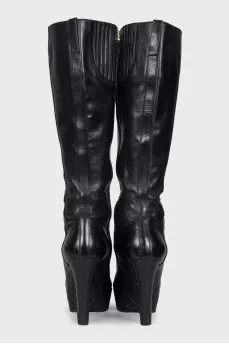 High-heeled leather boots