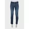 Men's blue jeans with embroidery on the pockets