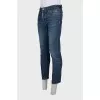 Men's blue jeans with embroidery on the pockets