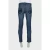 Men's blue jeans with embroidery on the pockets