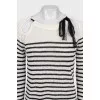 Striped jumper with a bow