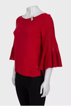 Red jumper with crystals