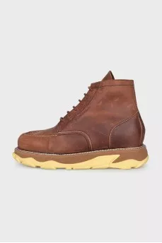Men's leather boots with an accent sole