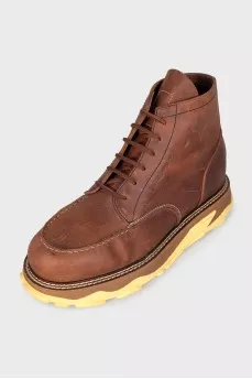 Men's leather boots with an accent sole