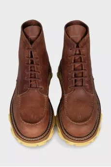 Men's leather boots with an accent sole