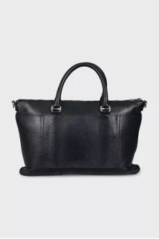 Leather bag with a textile strap