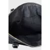 Leather bag with a textile strap