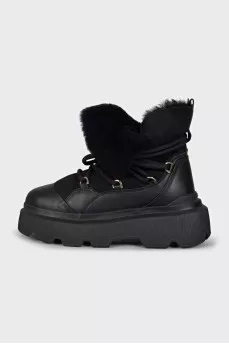 Insulated black boots with a massive sole