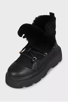 Insulated black boots with a massive sole