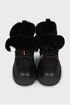 Insulated black boots with a massive sole