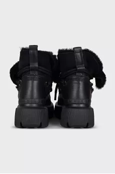 Insulated black boots with a massive sole