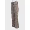 Wide-leg jeans with a distressed effect