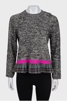 Grey jumper with a checked frill