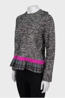 Grey jumper with a checked frill
