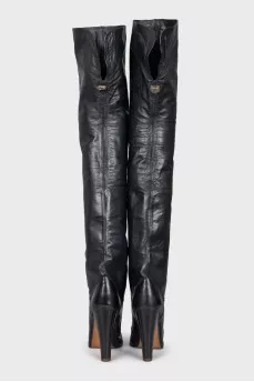 Leather over-the-knee boots with a stacked heel