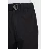 Black trousers with drawstrings on the legs